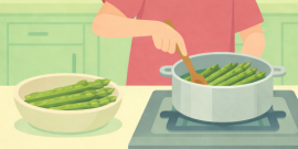 So essen Sie sich im Frühling fit für den Alltag 🍽️ Person stirs asparagus in a pot on the stove, with a bowl of asparagus nearby on the counter.